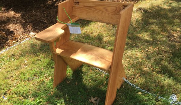 chair desk made with wood from the UConn Forest outside the WB Young building on the UConn Storrs campus